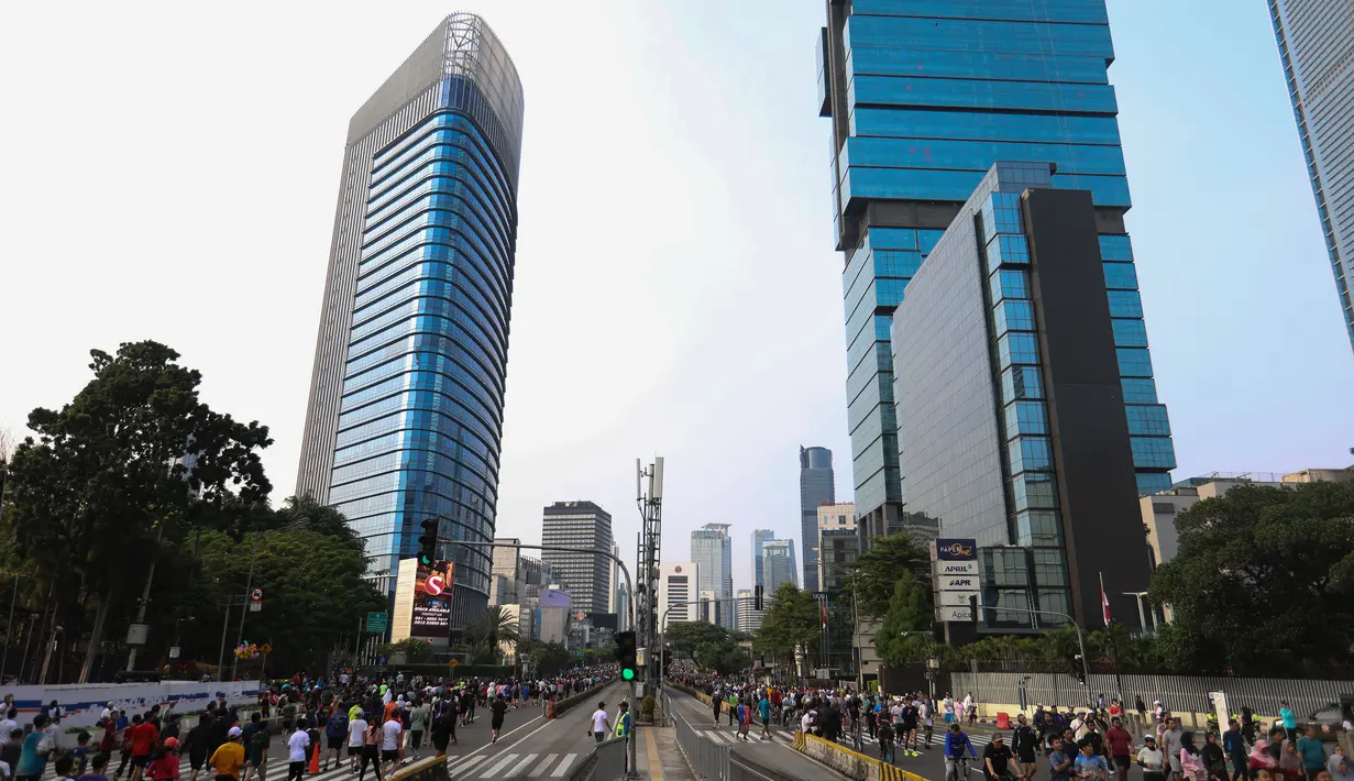 Dua ruas jalan utama tersebut dialihkan menjadi ruang publik bagi pejalan kaki, pesepeda, hingga komunitas hobi. (Kapanlagi.com/Budy Santoso)