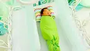 Anak ketiga pasangan Oki dan Ory Vitrio lahir pada 18 Desember 2017. Ibrahim Muhammad Abdullah nama anak ketiga pasangan ini yang dilahirkan melalui proses caesar. (Instagram/okisetianadewi)