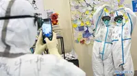 Para tenaga medis yang berjibaku di garda depan melawan Virus Corona. (Sumber: xinhua news)