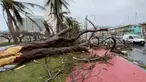 Kerusakan yang disebabkan oleh angin kencang dan curah hujan sehari setelah Topan Mawar melewati Teluk Tumon, Guam, 25 Mei 2023. (AFP/James Reynolds)