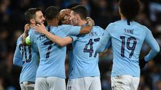 Perayaan gol Man City pada leg kedua, babak 16 besar Liga Champions yang berlangsung di Stadion Etihad, Manchester, Rabu (13/3). Man City menang 7-0 atas Schalke. (AFP/Oli Scarff)