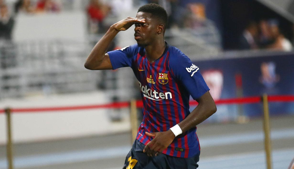 Gelandang Barcelona, Ousmane Dembele, merayakan gol yang dicetak ke gawang Sevilla pada laga Piala Super Spanyol di Stadion Ibn Batouta, Tangiers, Minggu (12/8/2018). Barcelona menang 2-1 atas Sevilla. (AP/Mosa'ab Elshamy)