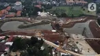 Foto udara suasana pembangunan Waduk Lebak Bulus, Jakarta Selatan, Selasa (11/10/2022). Pembangunan waduk seluas 4,4 hektare tersebut menjadi salah satu upaya untuk mengendalikan banjir akibat luapan air sungai di Jakarta Selatan. (Liputan6.com/Herman Zakharia)