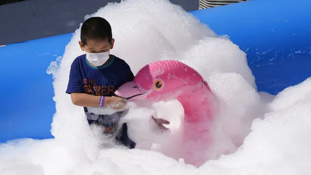 FOTO: China Izinkan Warganya Punya Tiga Anak