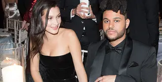 Bella Hadid dan The Weeknd tertangkap tengah ngobrol dengan akrab dalam sebuah pesta pada 10 May 2018. (REX/Shutterstock)