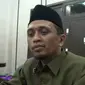 Ketua DPRD Pasuruan menilai ada kode etik yang dilanggar anggotanya yang dijemput Densus 88 saat tiba di Bandara Juanda. (Liputan6.com/Dian Kurniawan)