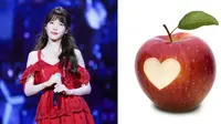 Untuk menjaga bentuk tubuhnya tetap ideal, IU pun memutuskan untuk melakukan det. Ia mengonsumsi apel setiap kali makan. (Foto: koreaboo.com)