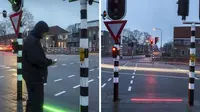 Di Belanda ada lampu lalu lintas yang cahayanya sampai ke trotoar. Ini khusus dibuat untuk para pecandu ponsel (Foto: networkedindia.com).