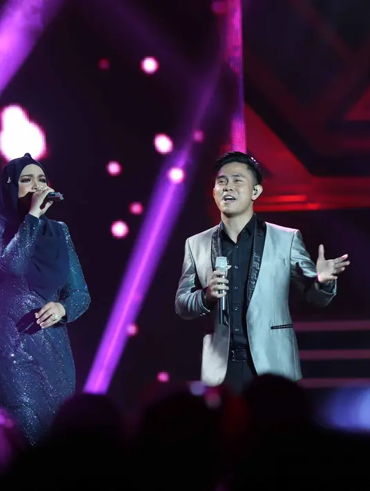 Berbagai pujian dilontarkan oleh istri dari Datuk Sri Khalid Mohamad Jiwa itu dengan teman duetnya. Bahkan, ia mendoakan penyanyi jebolan D'Academy, Lesti menjadi penyanyi hebat di Indonesia. (Nurwahyunan/Bintang.com)