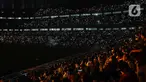 Warga memenuhi tribun penonton pada malam puncak Perayaan HUT ke-495 tahun Jakarta di Jakarta International Stadium (JIS), Jakarta, Sabtu (25/6/2022). Malam puncak Jakarta Hajatan tersebut bertemakan 'Collaborate, Accelerate, Elevate'. (Liputan6.com/Herman Zakharia)