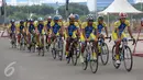 Tim sepeda PGN Road Cycling Team (P-RCT) sedang melakukan test lap sebelum start race dalam kejuaraan JIEXPOCriterium 2017 di JIEXPO Kemayoran(15/4). P-RCT mengirimkan 14 atlet untuk tampil di enam kategori. (Liputan6.com/Istimewa)