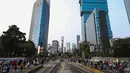 Dua ruas jalan utama tersebut dialihkan menjadi ruang publik bagi pejalan kaki, pesepeda, hingga komunitas hobi. (Kapanlagi.com/Budy Santoso)
