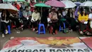 Suasana kebaktian jemaat GKI Yasmin dan HKBP Filadelfia di depan Istana Merdeka, Jakarta, Minggu (19/7/2015). Mereka berharap Presiden Jokowi berani menegakan hukum dan konstitusi terkait GKI Yasmin dan HKBP Fladelfia. (Liputan6.com/Johan Tallo)
