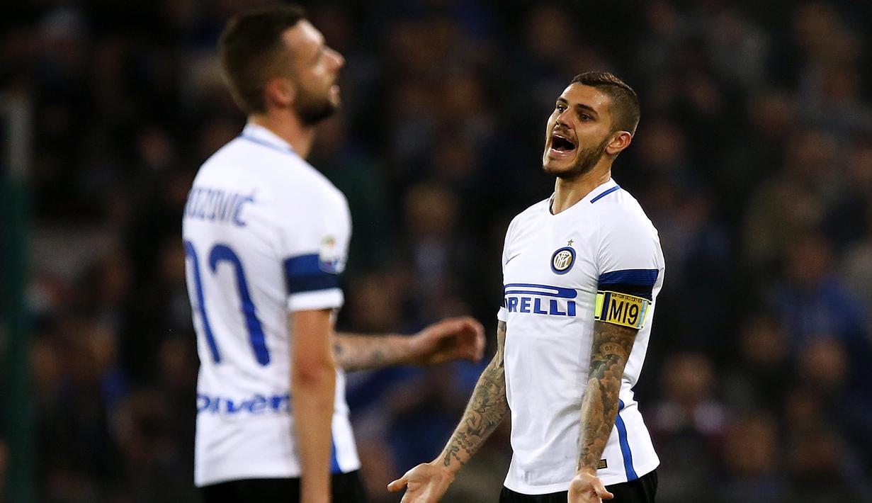 Ekpsresi kapten Inter Milan, Mauro Emanuel Icardi (kanan) saat timnya kalah dari Sampdoria pada lanjutan Serie A Italia di Luigi Ferraris Stadium, Genoa (30/10/2016). (AFP/Marco Bertorello)