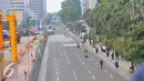 Suasana jalan lengang di kawasan bundaran HI, Jakarta, Jumat (4/11). Kawasan tersebut yang biasanya padat lalu lintas menjadi lengang akibat adanya Aksi Damai 4 November. (Liputan6.com/Angga Yuniar)