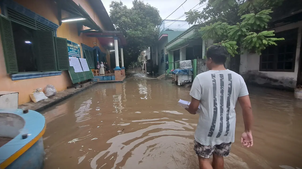 Akses jalan di wilayah kabupaten Tangerang Untuk Menuju TPS Mengalami Banjir