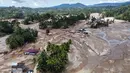 Sejak Senin (24/11/2025), banjir bandang dan tanah longsor besar menerjang Batang Toru, Tapanuli Selatan, Sumatera Utara. Tampak pemandangan desa yang terdampak banjir bandang di Batang Toru, Sumatera Utara, Senin 1 Desember 2025. (AP Photo/Binsar Bakkara)