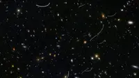 Galaksi dengan asteroid. (NASA/ESA/STScI/B. Sunnquist/J. Mack)
