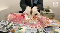 Rupiah Ambruk ke Rp 18.129 per Dolar AS, IHSG Ikut Turun Hampir 3%