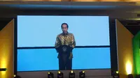Presiden Jokowi menghadiri acara puncak HUT ke-58 Partai Golkar. (Merdeka.com)