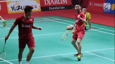 Ganda putra Indonesia, Kevin Sanjaya/Marcus Gideon bersorak usai melawan Chen Hung Ling/Wang Chi-Lin (Taiwan) pada perempat final Indonesia Masters 2018 di Jakarta, Jumat (26/1). Kevin/Marcus unggul 20-22 21-14 21-14. (Liputan6.com/Helmi Fithriansyah)