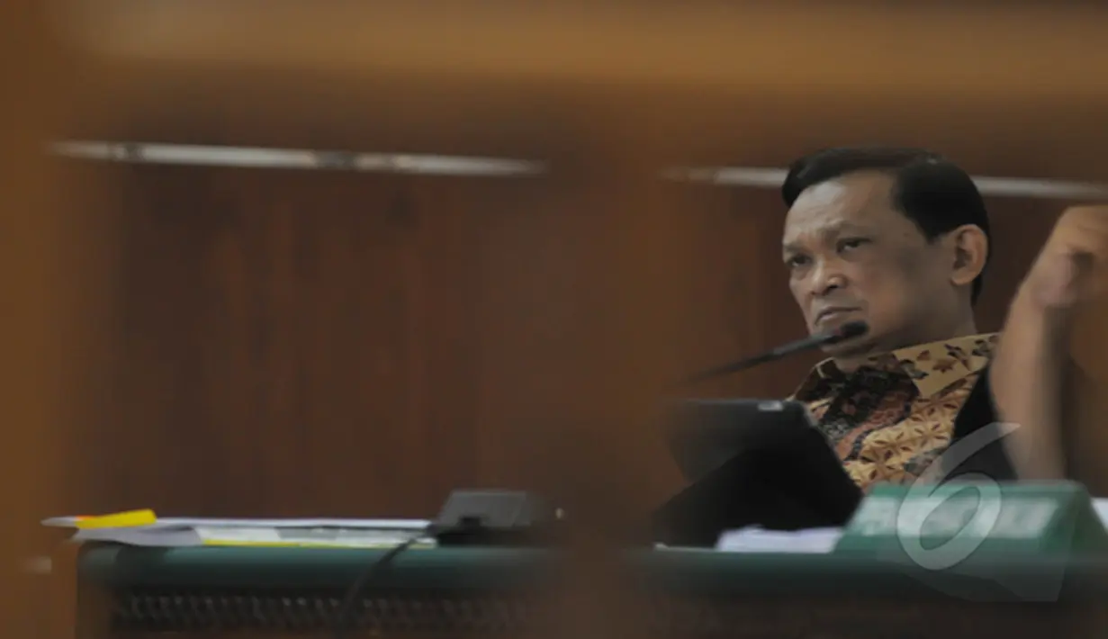 Terdakwa kasus korupsi pengadaan simulator SIM di Korlantas Polri, Brigjen Pol Didik Purnomo  mengikuti sidang lanjutan dengan agenda mendengarkan keterangan saksi di Pengadilan Tipikor Jakarta, Kamis (5/2/2015).  (Liputan6.com/Herman Zakharia)