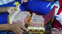 Pernikahan dini di Bombana, Sulawesi Tenggara. Fika Alvira (14) dinikahi Saimul (19) dengan mahar Rp 127 juta. (Foto: Istimewa/Liputan6/Ahmad Akbar Fua)