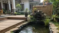 Model Kolam Ikan Batu Alam dan Bambu (created by AI)