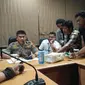 Polisi siber Polda Sulsel menetapkan dua tersangka dalam kasus penyebaran berita hoaks penculikan anak di Makassar (Liputan6.com/ Eka Hakim)