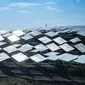 Foto yang diabadikan dari udara menunjukkan panel-panel fotovoltaik di pembangkit listrik tenaga surya fotovoltaik di wilayah Weining, Provinsi Guizhou, China, 26 April 2020. (Xinhua/Tao Liang)