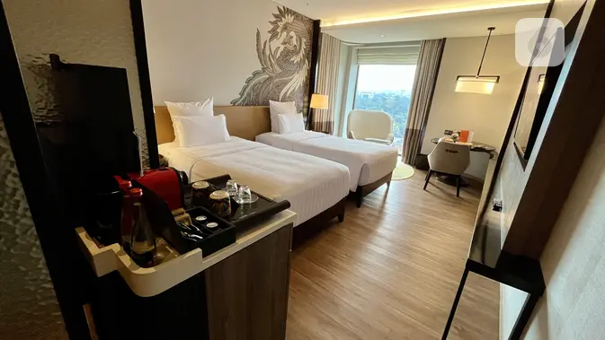 <p>Kamar Hotel Pullman Bandung Grand Central. (Liputan6.com/Raden Trimutia Hatta)</p>