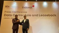 Indosat mengumumkan telah melepas kepemilikan seluruh data center mereka yang totalnya berjumlah dalam perjanjian dengan BDx Indonesia. Dalam foto: kiri Presdir & CEO IOH Vikram Sinha dan CEO BDx Mayank Srivastava (Liputan6.com/ Agustin Setyo Wardani)