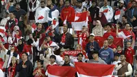 Timnas Indonesia sukses memulangkan Vietnam dari ajang Piala Asia 2023 berkat kemenangan 1-0 pada laga kedua Grup D di Abdullah Bin Khalifa Stadium, Doha, Qatar, Jumat (19/1/2024). Meski masih meyisakan satu laga lagi, namun pelaung Vietnam untuk lolos ke babak 16 besar otomatis telah tertutup. Kemenangan Timnas Garuda berkat gol penalti Asnawi Mangkualam juga tak lepas dari dukungan sekitar dua ribu suporter yang merupakan diaspora Indonesia, alias warga keturunan Indonesia yang menetap di Qatar yang hadir langsung di stadion. (AFP/Karim Jaafar)