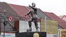 Patung Kapten Tubagus Muslihat di Simpang Jalan Kapten Muslihat, Kota Bogor, Jawa Barat, Senin (26/12/2022). Patung hasil karya seniman Yayat Darajat ini merekonstruksi wajah, tubuh dan perawakan pahlawan yang gugur di medan perang usai tertembak di Jembatan Merah. (Liputan6.com/Magang/Aida Nuralifa)