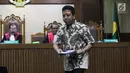 Mantan Ketua Umum PPP, M Romahurmuziy saat menjalani sidang pembacaan dakwaan di Pengadilan Tipikor, Jakarta, Rabu (11/9/2019). M Romahurmuziy didakwa terlibat kasus suap jual-beli jabatan di lingkungan Kementerian Agama (Kemenag). (Liputan6.com/Helmi Fithriansyah)