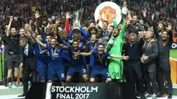 Manchester United adalah klub tersukses kedua dengan meraih 45 trofi utama yaitu 20 gelar liga, 12 Piala FA, 5 Piala Liga Inggris, tiga 3 gelar Liga Champions, 1 trofi Liga Europa, 1 Piala Winners Eropa, 1 Piala Dunia Antarklub, 1 Piala Interkontinental, dan 1 Piala Super Eropa. (AFP/Paul Ellis)