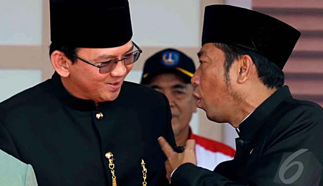 Ahok dan H. Lulung terlihat akur di acara Lebaran Betawi. Padahal seminggu terakhir mereka terlihat bersitegang dengan komentar keras satu sama lain, Jakarta, Minggu (14/9/2014) (Liputan6.com/Faisal R Syam)