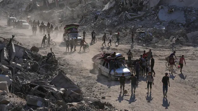 Di Antara Puing dan Reruntuhan, Warga Gaza Kembali ke Rumah
