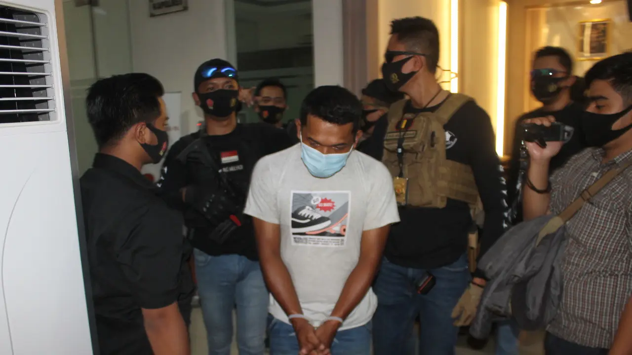 Wawan Gunawan (41) saat ditangkap polisi (Ady Anugrahadi/Liputan6.com)