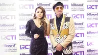 Aurel Hermansyah dan Atta Halilintar malam puncak Billboard Indonesia Music Awards 2020 di kawasan Kebon Jeruk Jakarta Barat, Rabu (26/2/2020). (Bambang E Ros/Fimela.com)