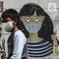 Mural imbauan untuk mematuhi protokol kesehatan terlihat pada dinding di Jakarta, Selasa (20/7/2021). Kementerian Kesehatan mencatat pasien COVID-19 di Jakarta yang sembuh pada 19 Juli 2021 sebanyak 12.674 atau meningkat dibandingkan 18 Juli 2021 sebanyak 11.857 orang. (Liputan6.com/Johan Tallo)