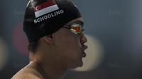 Perenang Singapura, Joseph Schooling, meraih emas SEA Games cabang renang nomor 200 meter kupu-kupu di National Aquatic Stadium, Kuala Lumpur, Rabu (23/8/2017). Schooling meraih emas dengan catatan waktu 51,38 detik. (Bola.com/Vitalis Yogi Trisna)