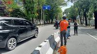Polisi olah TKP di lokasi tarik tambang berujung maut di Makassar (Liputan6.com/Fauzan)
