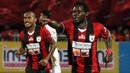 Striker Persipura, James Koko Lomell, merayakan gol yang dicetaknya ke gawang Persija pada laga Torabika Soccer Championship 2016 di Stadion Mandala, Jayapura, Jumat (29/4/2016). (Bola.com/Nicklas Hanoatubun)
