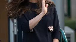 Kate Middleton saat melakukan kunjungan ke SD Barlby di London, pada tanggal 15 Januari 2015. (AFP Photo/Leon Neal) 