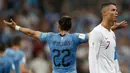 7. Raut kekecewaan terpancar dari wajah Cristiano Ronaldo setelah Potugal disingkirkan Uruguay pada babak 16 besar Piala Dunia 2018. (AFP/Adrian Dennis)