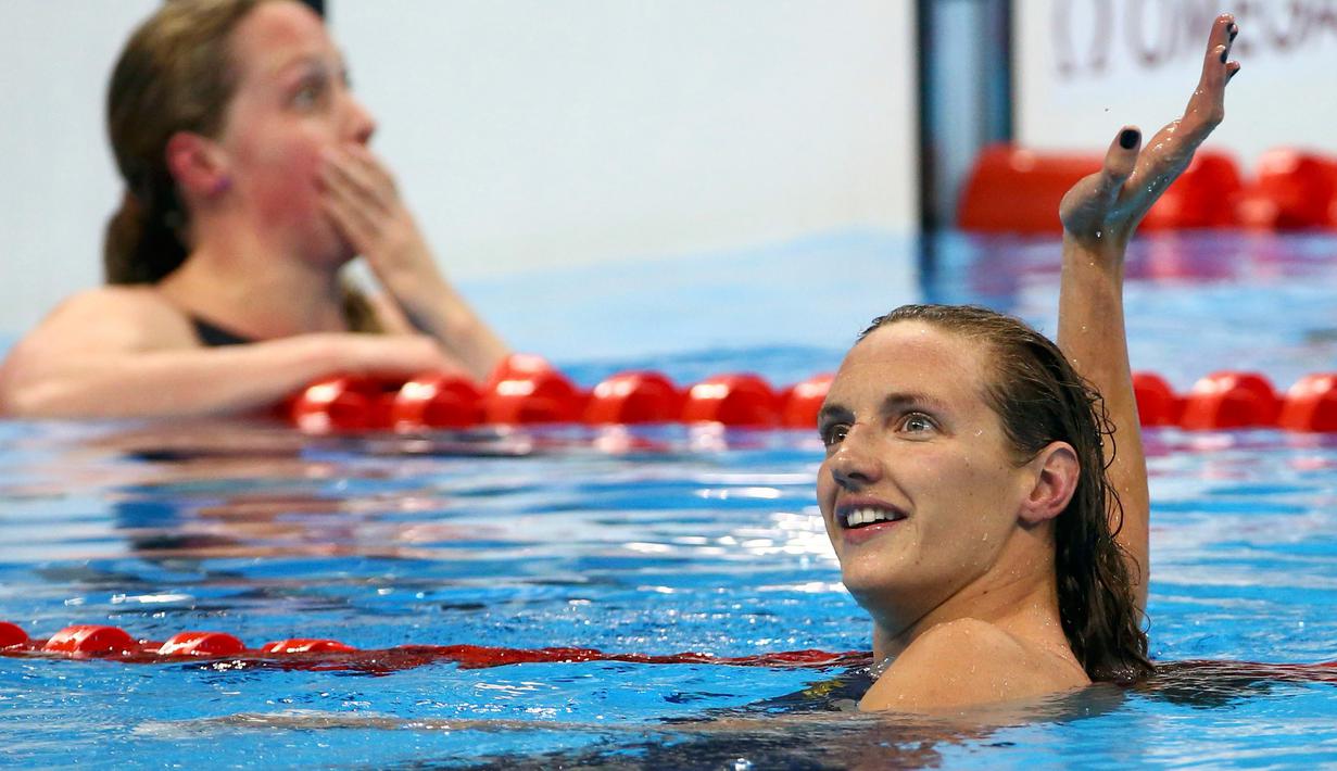 Atlet renang Hungaria, Katinka Hosszú merayakan kemenangannya usai menyelesaikan perlombaan renang 400m gaya bebas pada Olimpiade 2016 di Stadium Aquatics, Brasil, (6/8). (REUTERS/David Gray)