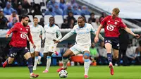 Hasil ini membuat Lille naik ke posisi 5 dengan 47 poin, menggeser AS Monaco. Sedangkan Sedangkan Marseille tidak beranjak dari posisi tiga dengan 49 poin dan berpotensi disalip pada pekan selanjutnya. (AFP/Pascal Pochard-Casabianca)