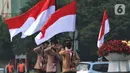 Berbagai elemen masyarakat, mulai dari pelajar, mahasiswa, pekerja, hingga komunitas-komunitas lokal, turut ambil bagian dalam upacara ini. (merdeka.com / Imam Buhori)