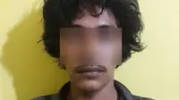 Petani kopra berinisial PS, 24, warga Kepulauan Mentawai yang melakukan tindak pemerkosaan terhadap seorang turis asal Denmark (Istimewa/JawaPos.com)